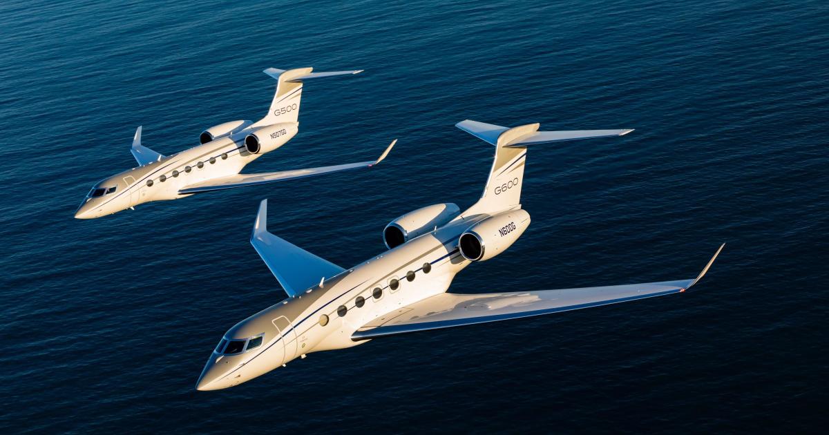 A G500 and a G600 in flight over water