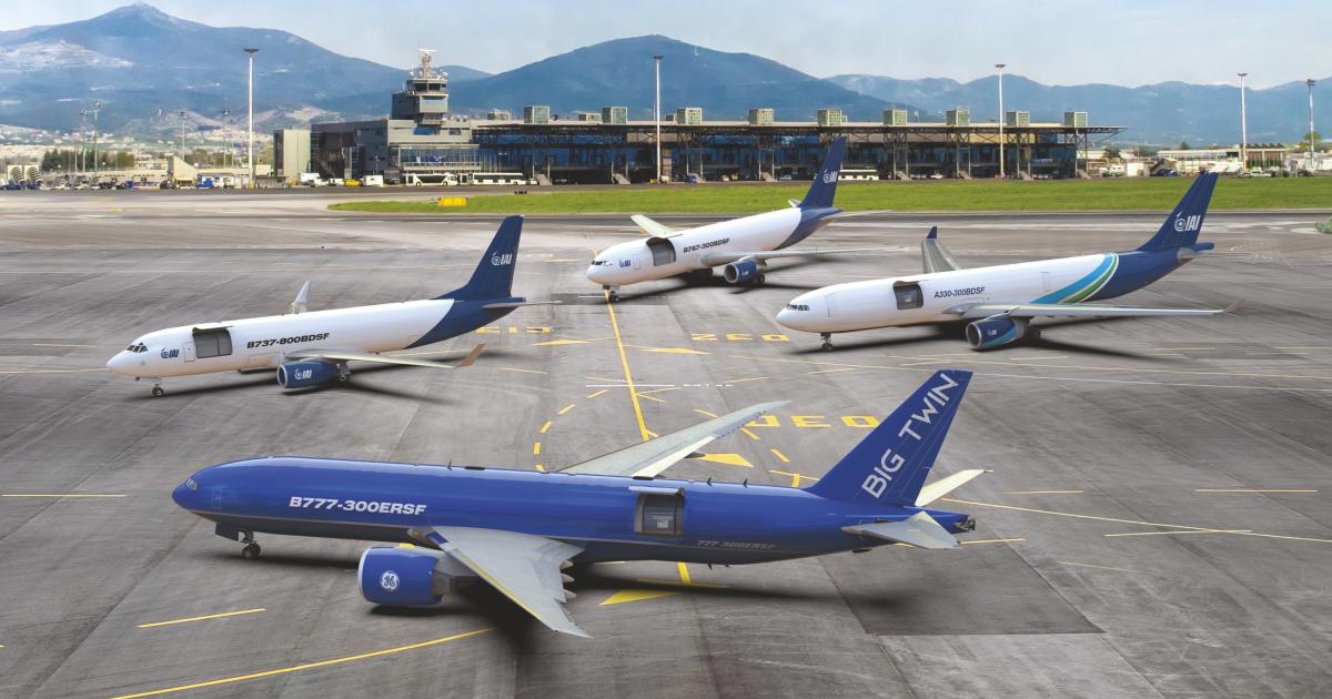 Four blue-and-white IAI converted freighters parked on an airport ramp, with a Boeing 777-300ERSF in the foreground