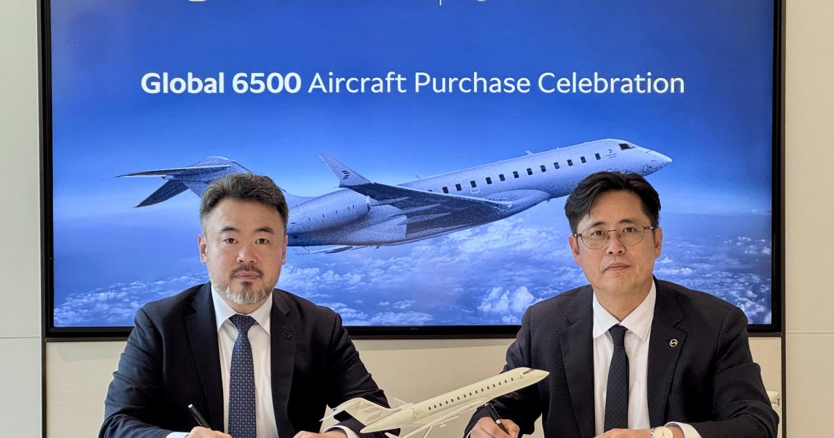  HyeonCheol Cho, v-p of defense business for Korean Air (right), with Hoon Seok Jang, sales director for Bombardier Defense