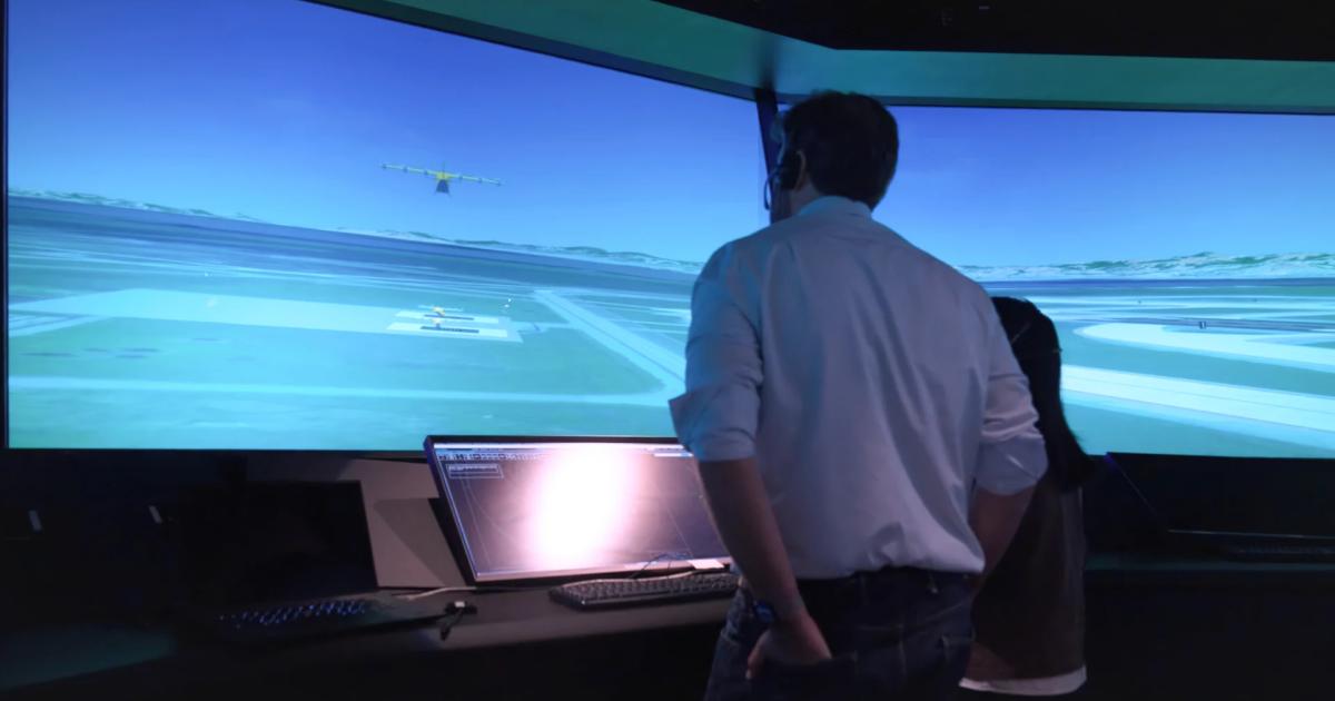 A controller monitors simulated traffic inside NASA’s air traffic control simulation laboratory at the agency’s Ames Research Center.