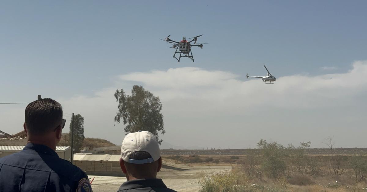 A drone and helicopter avoid each other