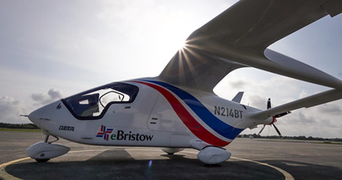 Alia CX300 on tarmac with Bristow logo on rear fuselage 