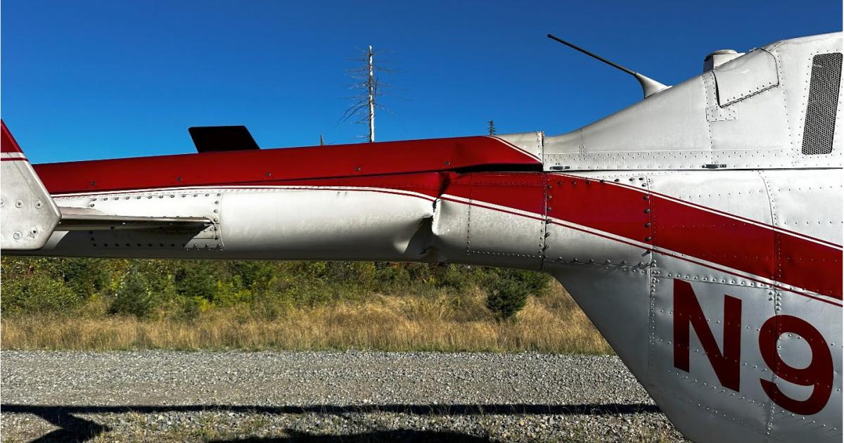 Damaged tail boom due to vertical hop
