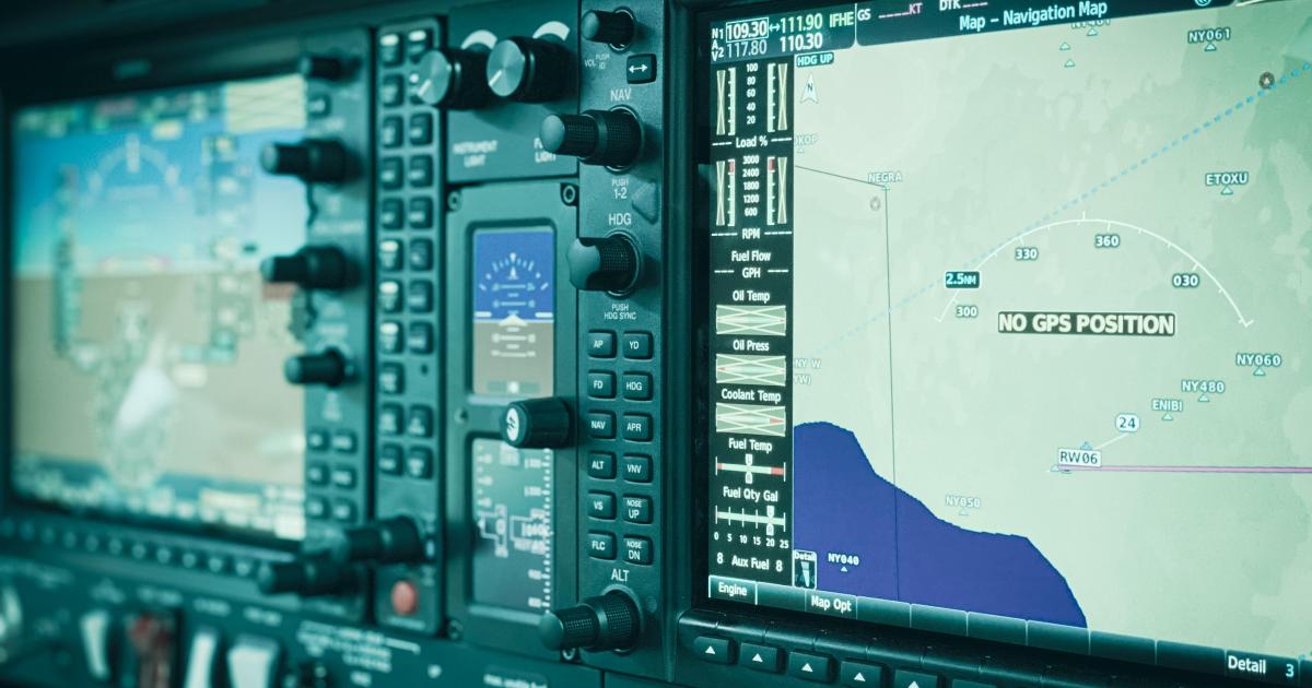 a close up view of an aircraft cockpit showing contemporary avionics
