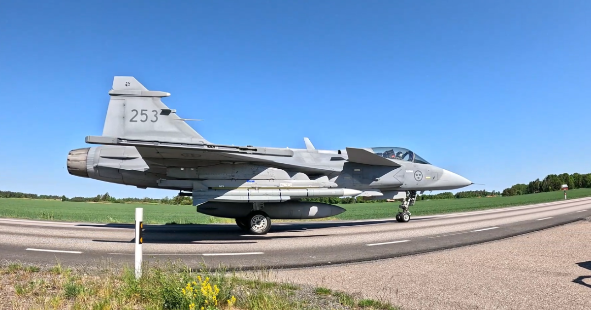 Gripen taxiing down road 