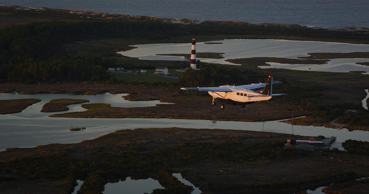 Joby’s autonomous Cessna Grand Caravan flies past Bodie Island Lighthouse