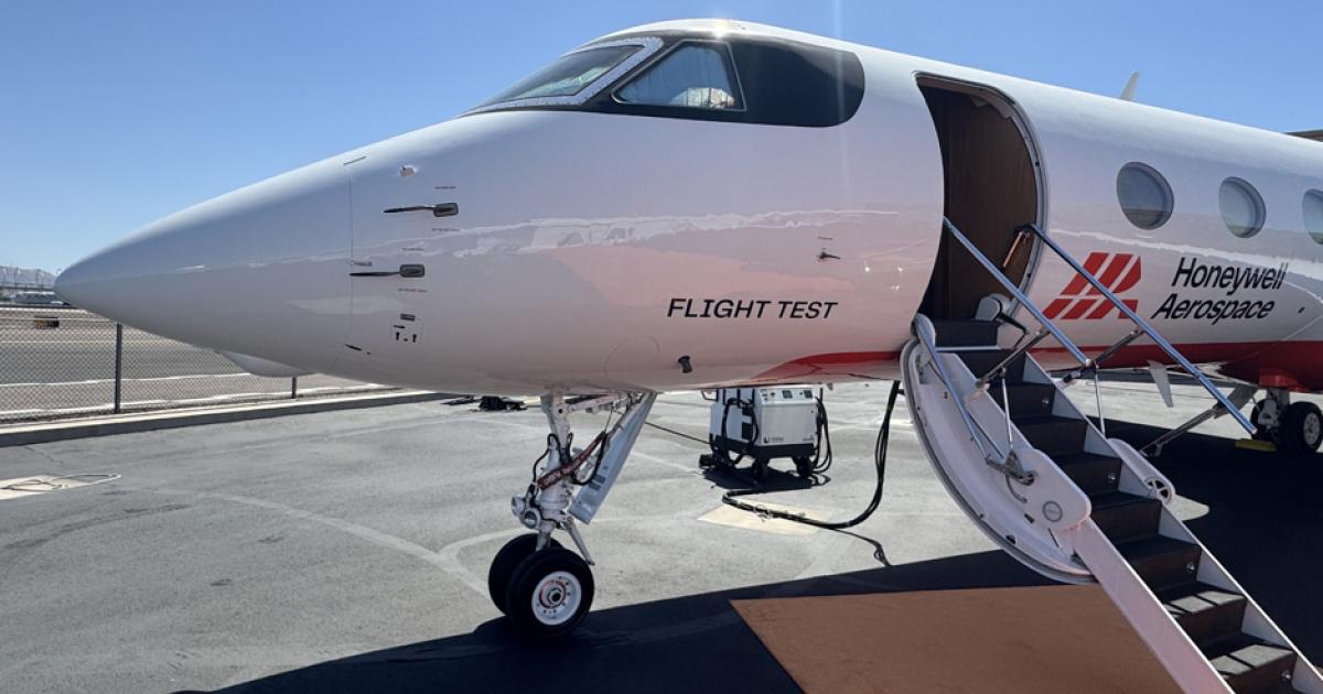 A Honeywell Aerospace flight-test jet parked on an airport ramp