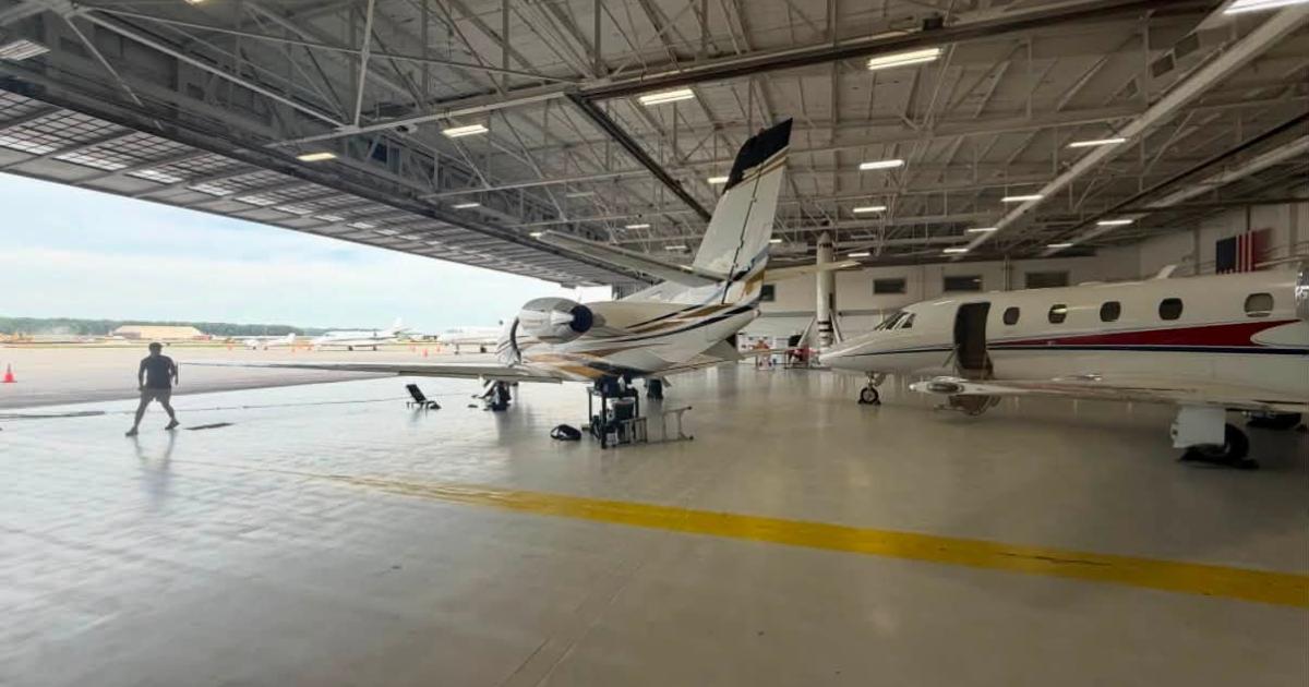 In-house maintenance and detailing crew prepare two of the aircraft for a late-night departure. 
