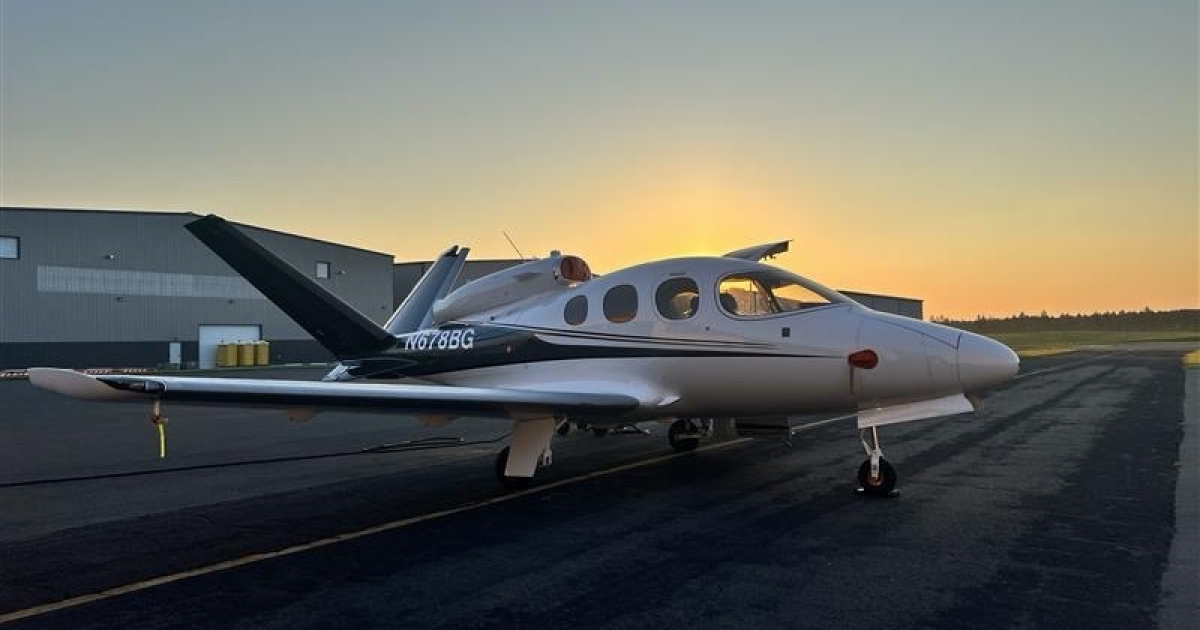 A Cirrus jet on a ramp at dusk