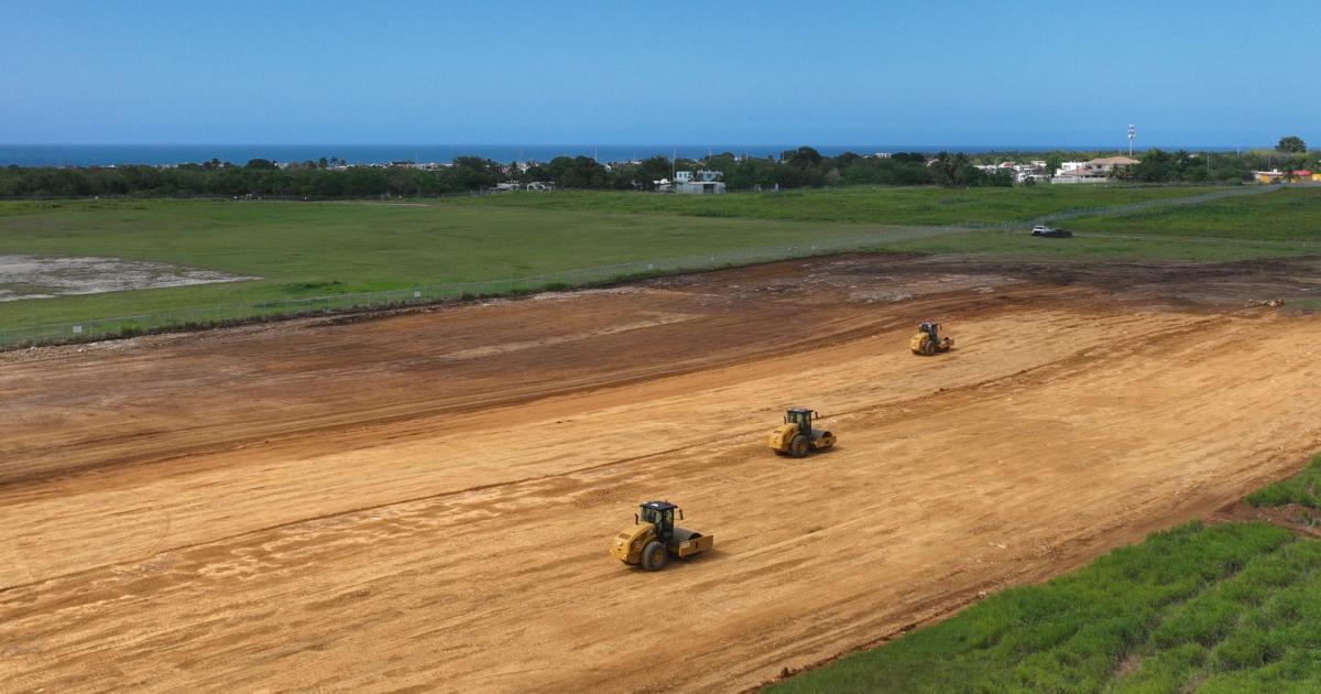 Compaction rollers on runway bed at Aguadilla