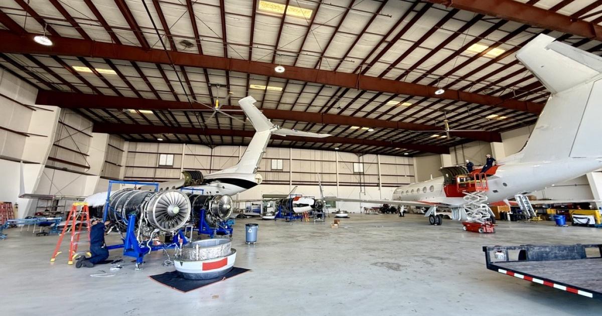 Maintenance hangar with two aircraft 