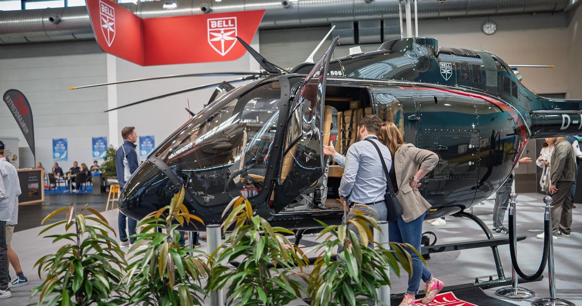 Bell helicopter on static display in exhibition hall 