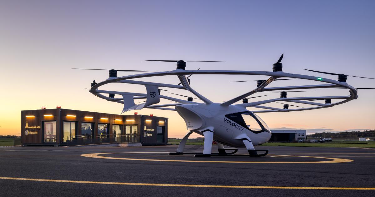 Volocopter's VoloCity eVTOL aircraft next to the vertiport facility at Pontoise-Cormeilles Airport near Paris.