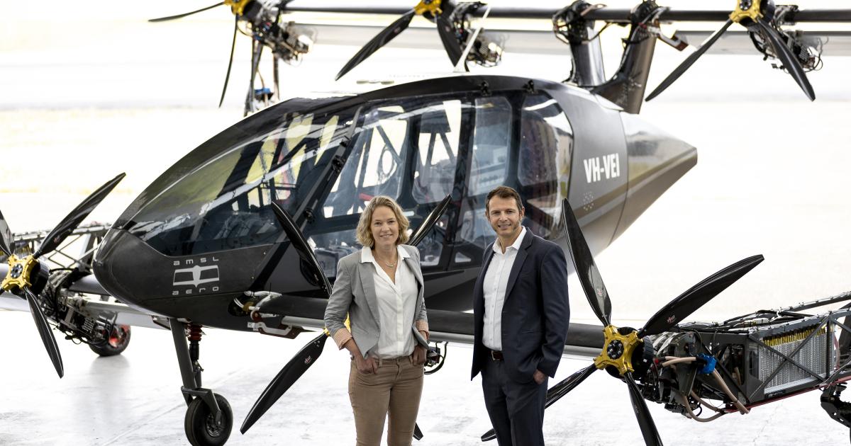 AMSL founders  Siobhan Lyndon and Andrew Moore with the first prototype of their Vertiia eVTOL aircraft.