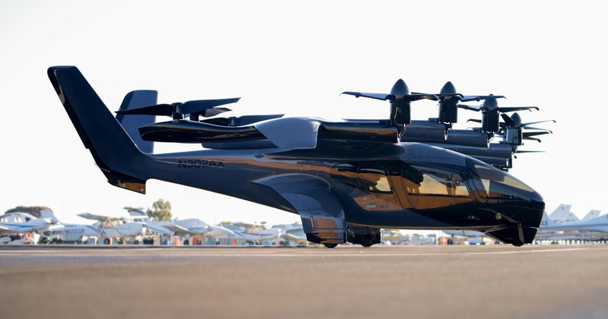 Archer's Midnight eVTOL air taxi is pictured on the tarmac at an airport.