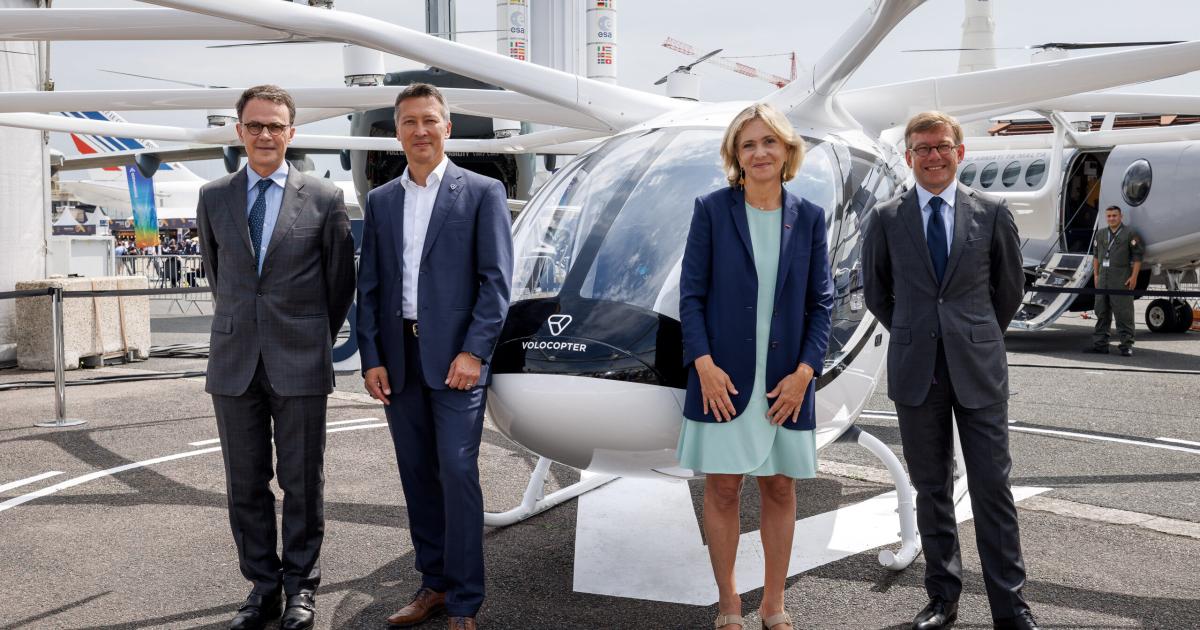 Officials from Volocopter, France's DGAC, Groupe ADP and Region Ilê de France at the 2023 Paris Air Show.