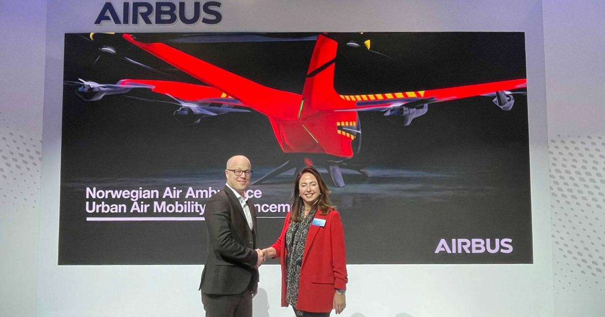Leif Olestad (left), representing the Norwegian Air Ambulance Foundation, announced a partnership with Airbus' head of urban air mobility Balkiz Sarihan.