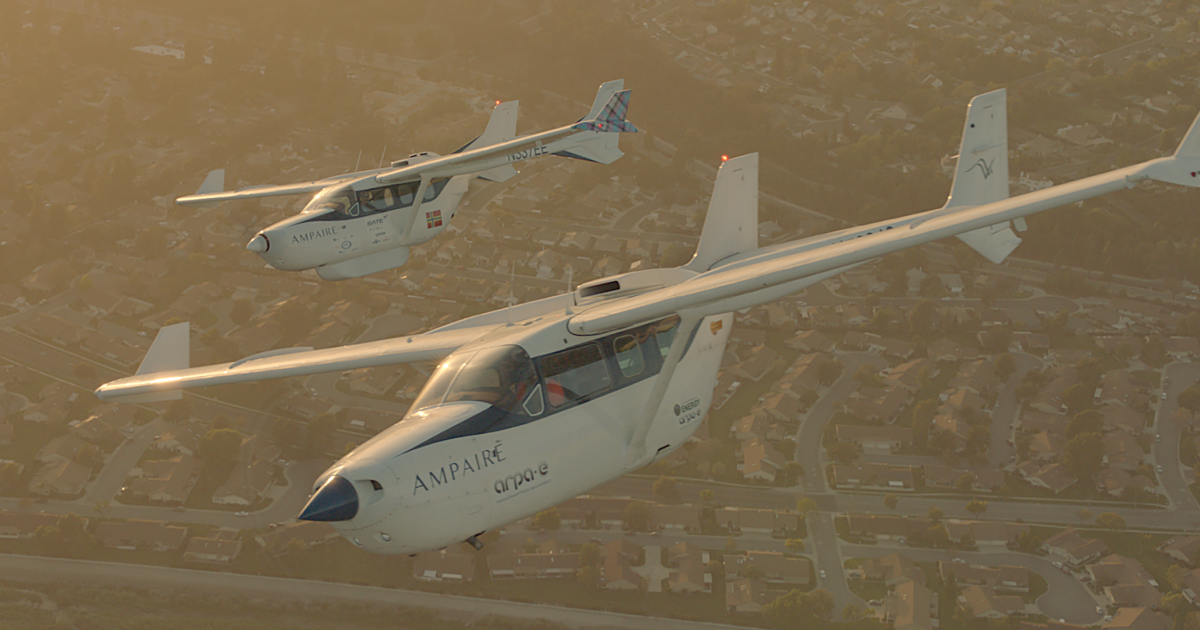 Two Ampaire hybrid-electric technology demonstrator aircraft fly in formation over California. The ARPA-E Bird, depicted in the foreground, is used to test new technology on behalf of ARPA-E.