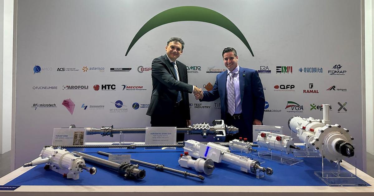 Umbra Group CEO Matteo Notarangelo and Supernal COO Adam Slepian shake hands after a signing ceremony for the partnership at the Paris airshow, on June 21, 2023. (Photo: Supernal)