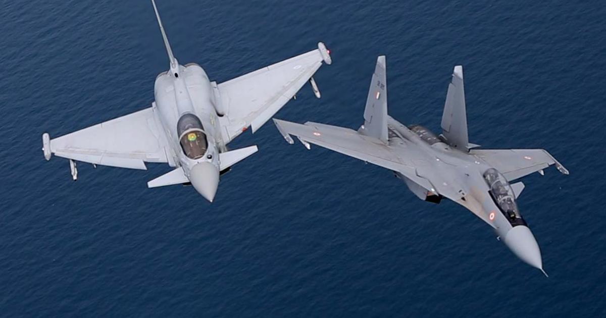 An RAF Typhoon and an Indian air force Flanker maneuvering over the North Sea during Exercise Indradhanush. (photo: MoD Crown Copyright)
