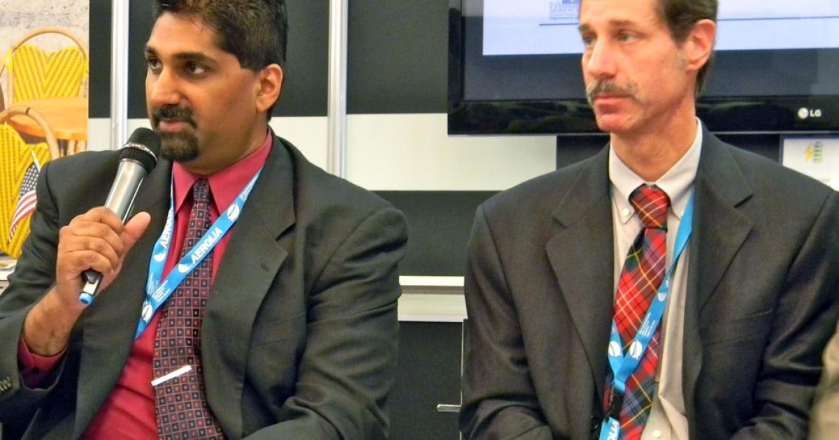 Rizwan Ramakdawala, senior aerospace engineer with the U.S. Defense Technology Security Administration (left), and Donald Beck, defense controls analyst with the State Department directorate of defense trade controls