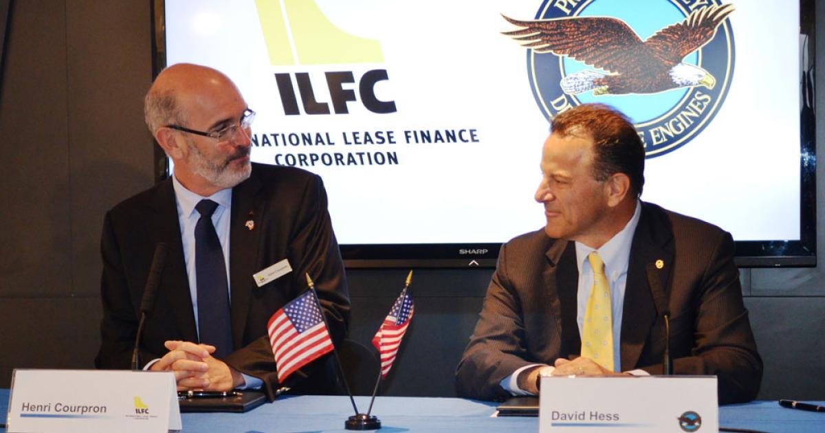 ILFC president and CEO Henri Courpron, left, has signed several leasing deals this week. Here, he inks a contract Pratt & Whitney president and CEO David Hess for P&W’s PurePower PW1100G-JM engines for ILFC’s growing fleet of Airbus A320neos.