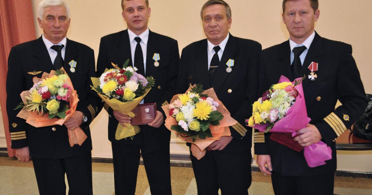 (L to r) UTAir flight engineer Vyacheslav Alberti; flight attendant Dmitriy Shmidt; copilot Yuriy Chigaev; and pilot-in-command Sergey Ignatov will receive the Sikorksy Humanitarian Award at tomorrow’s banquet.