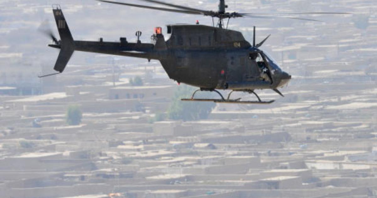 A U.S. Army OH-58D Kiowa Warrior conducts aerial reconnaissance over Afghanistan. The Army is testing an open-architecture improved data modem using the Kiowa Warrior and other platforms to create a data-sharing network. (Photo: U.S. Army)