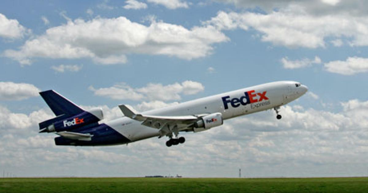 A FedEx Express MD-11 takes flight. The cargo carrier started operations with ATC data communications on January 13. (Photo: FedEx) 