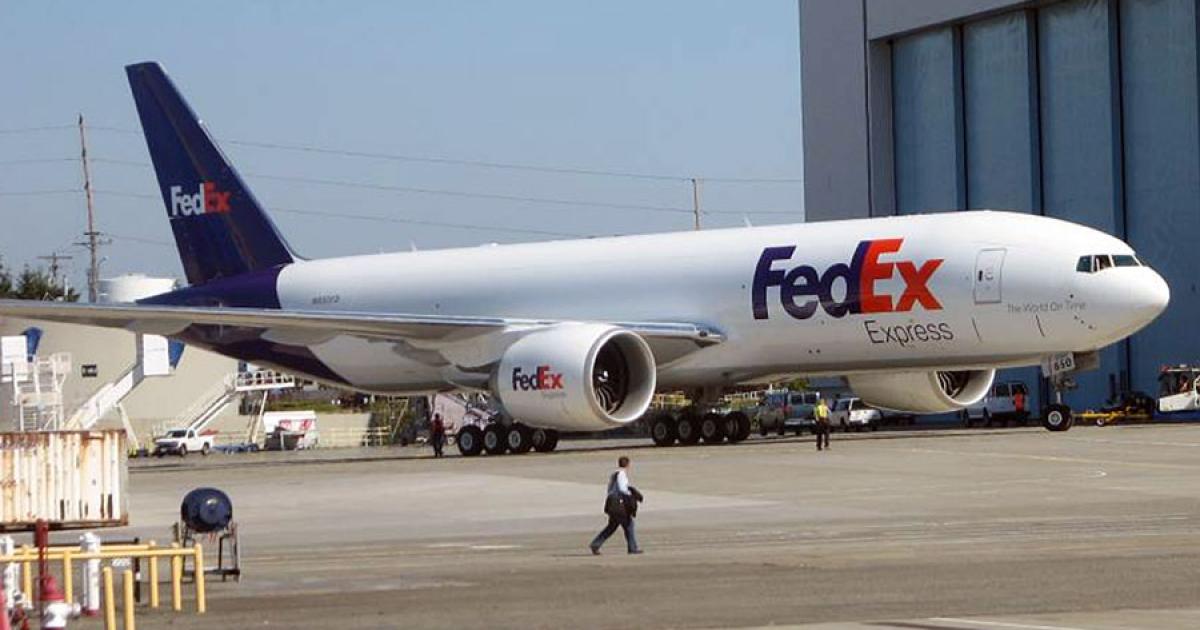 A FedEx Boeing 777 sits parked at Memphis International Airport. FedEx is an early beneficiary of the FAA’s revised wake turbulence separation standards. (Photo: FedEx)  