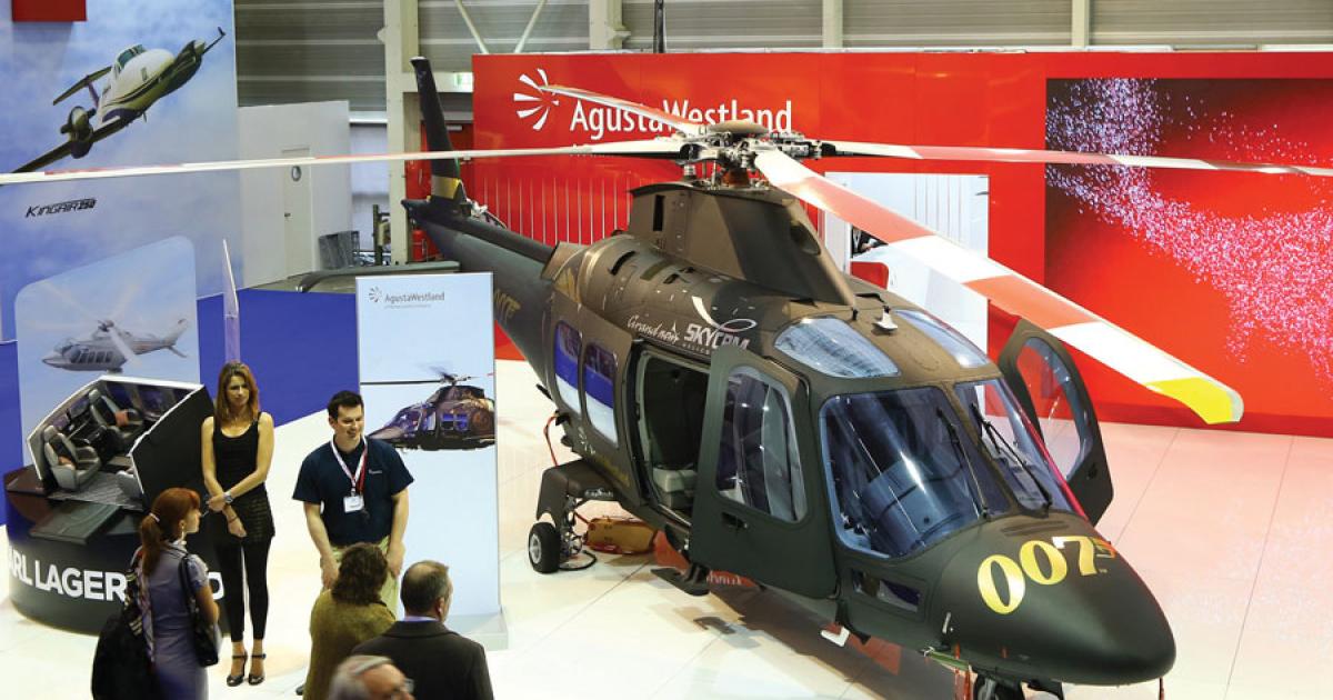 Russia’s Exclases has ordered five AW139 medium-twin helicopters and a single AgustaWestland GrandNew in VIP transport configuration. This GrandNew on display at AgustaWestland’s EBACE booth is sporting a special James Bond 007 livery. (David McIntosh)