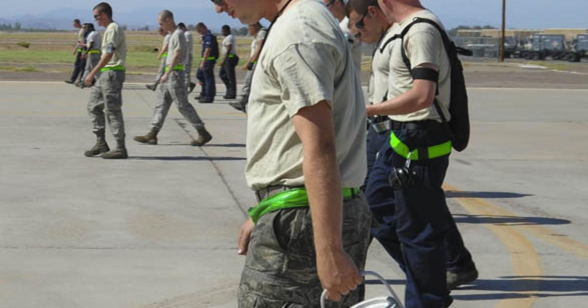 U.S. Air Force Personnel walk the flight line at Luke AFB once a year to clear foreign objects. Maybe this is an approach that FBOs and civil airports need to consider.