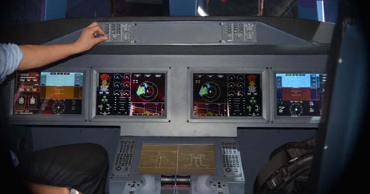China’s Comac is using an engineering flight simulator to develop the cockpit for its new C919 airliner, which now faces an unspecified delay in service entry due to a further one or two year hold-up in certifying its smaller ARJ21 aircraft. (Photo: Vladimir Karnozov)