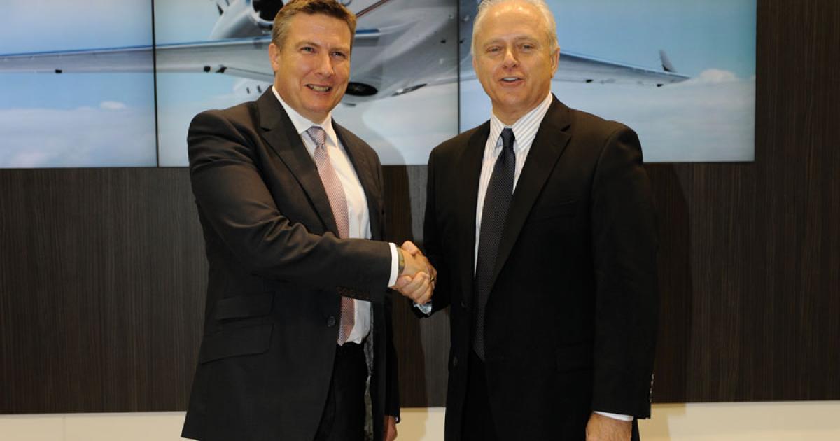 Mark Wilson, president and COO of NetJets Europe, with Embraer Executive Jets president Ernest Edwards. (Photo: Mark Wagner)