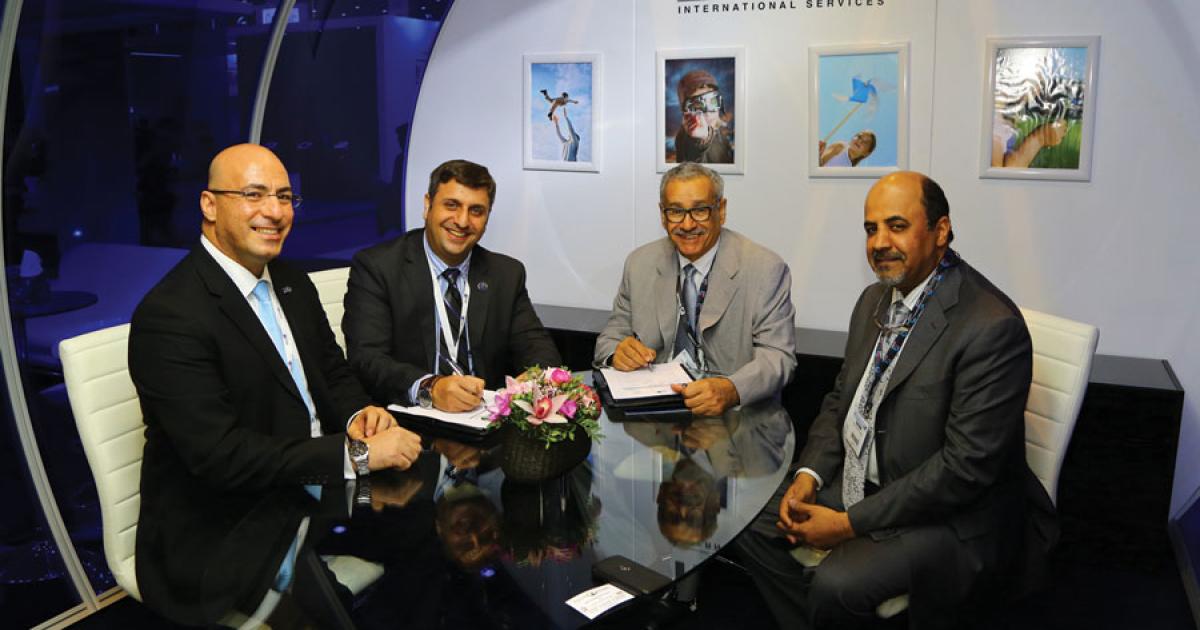 Left to right: Hadid’s Issa Zuriqi and Rasoul Taijo signed an agreement yesterday with Wallan Aviation’s Saad and Fahad Wallan to provide services in Saudi Arabia. (Photo: David McIntosh)