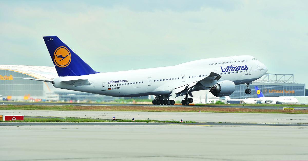 The first 747-8 passenger airliner takes off from Frankfurt on its maiden revenue flight on June 1.