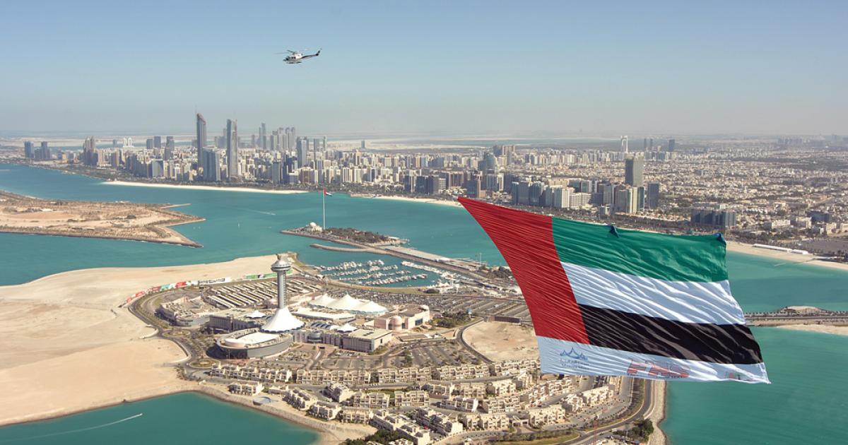 A Falcon Aviation Services Bell 412 lofted the UAE national flag high above Abu Dhabi’s seaside Corniche on UAE National Day. 