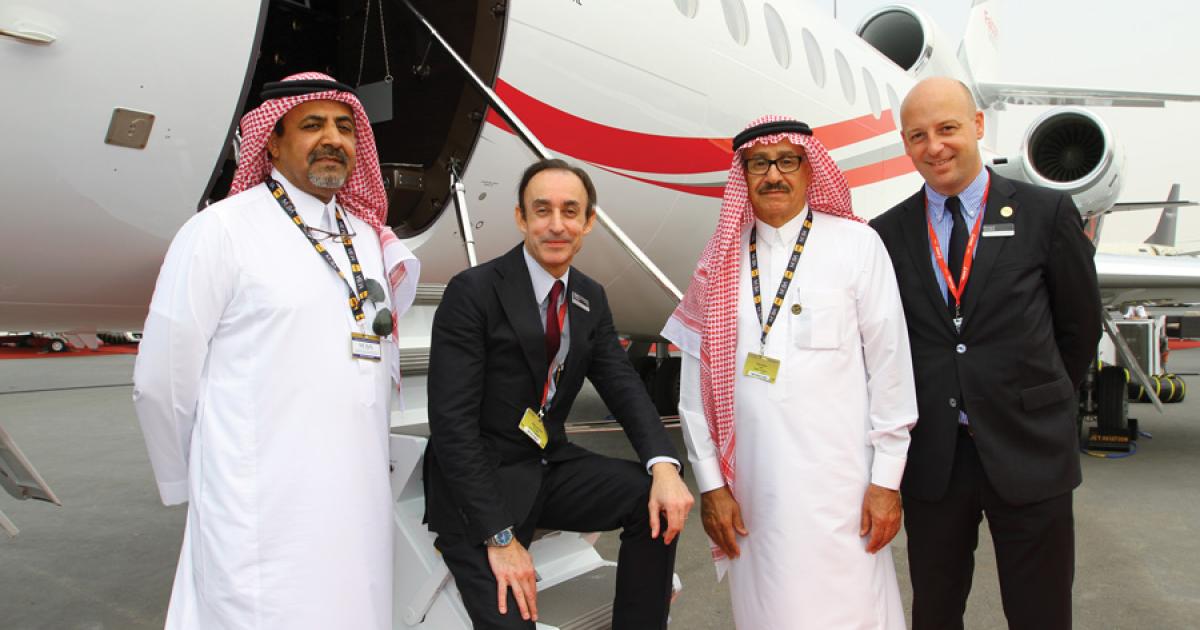 Marking the sale of two Falcon 900s to Cessna Middle East sales rep Wallan Aviation are (l-r) Fahad Wallan, v-p operations, Wallan Aviation; Gilles Gautier, Dassault’s v-p sales EMEA; Saad Wallan, chairman of Wallan Aviation; and Renaud Cloatre, Dassault Middle East sales director.