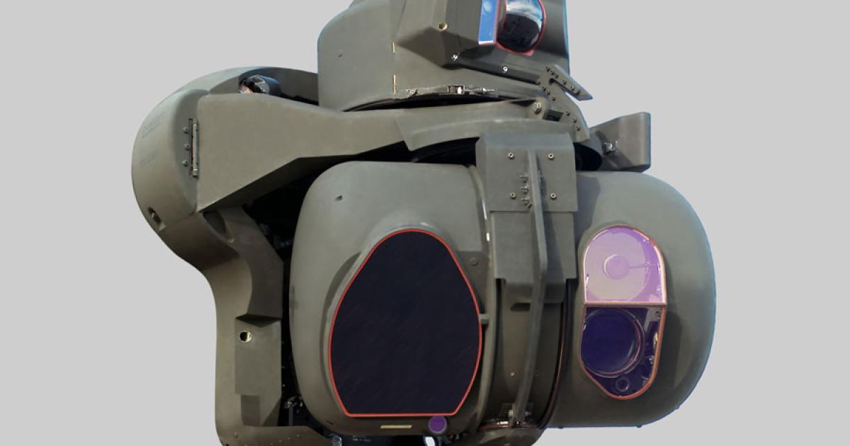 Lockheed Martin is upgrading the daylight television camera on the AH-64D Apache helicopter, shown at the lower right of the Modernized Target Acquisition and Designation System/Pilot Night Vision System (M-TADS/PNVS) mounted on the helicopter’s nose. (Photo: Lockheed Martin)
