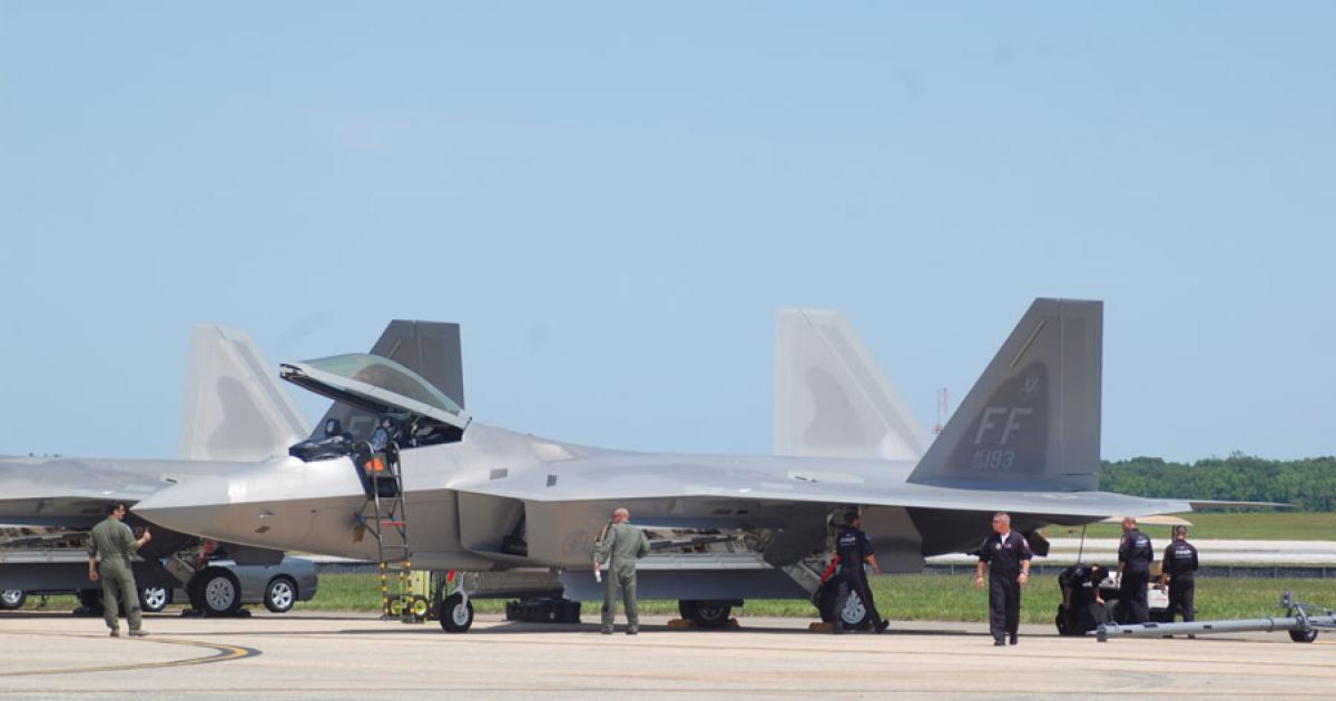 Restrictions on the U.S. Air Force fleet of F-22 Raptors will be gradually lifted now that the service believes it has identified the root cause of pilot hypoxia problems. These two aircraft appeared at the Andrews Joint Services Open House last May. (Photo: Chris Pocock)