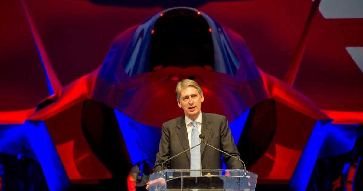 British Defense Secretary Philip Hammond formally accepted the first F-35B for the UK in a ceremony at Lockheed Martin’s Fort Worth facility on July 19. (Photo: UK Crown Copyright)