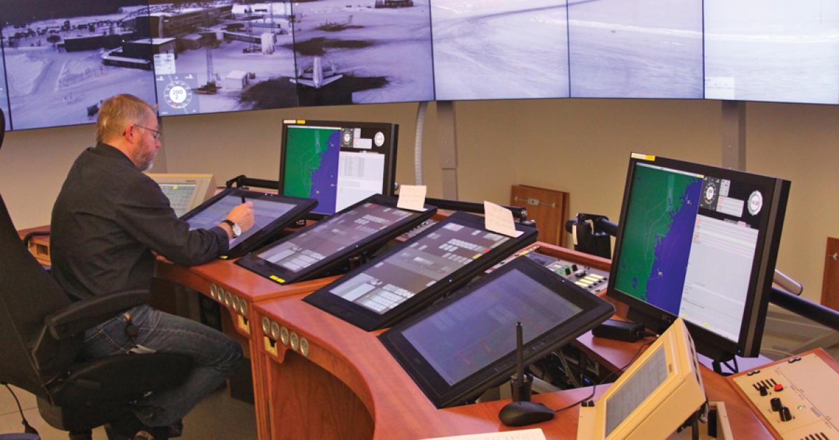 A controller staffs the remote tower center at Sundsvall, Sweden, which manages two airports. Operational certification by Sweden’s transport authority was expected this summer. (Photo: Saab) 