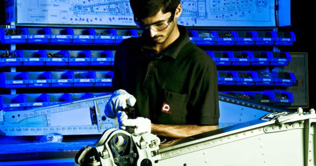 Indian private industry should be boosted by the country’s new defense offsets policy. Here, a worker from aerostructures specialist Dynamatic Aerospace assembles a flap-track beam for an Airbus A320. (Photo: Dynamatic Aerospace)