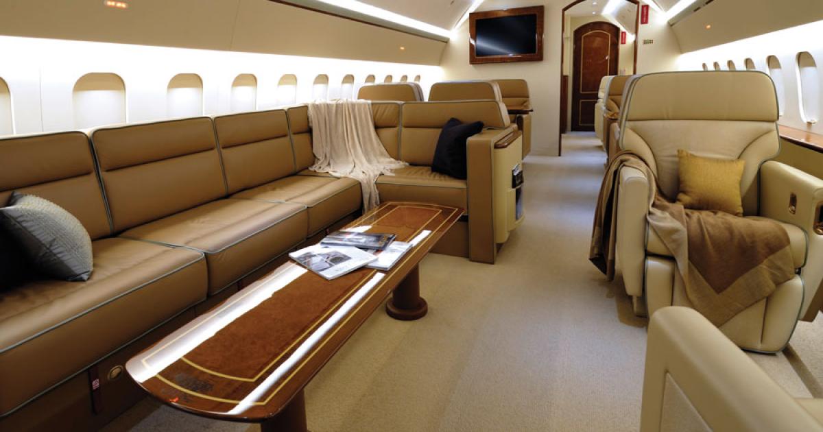 Associated Air Center recently completed this BBJ, which includes a main lounge with side-facing convertible divan. 