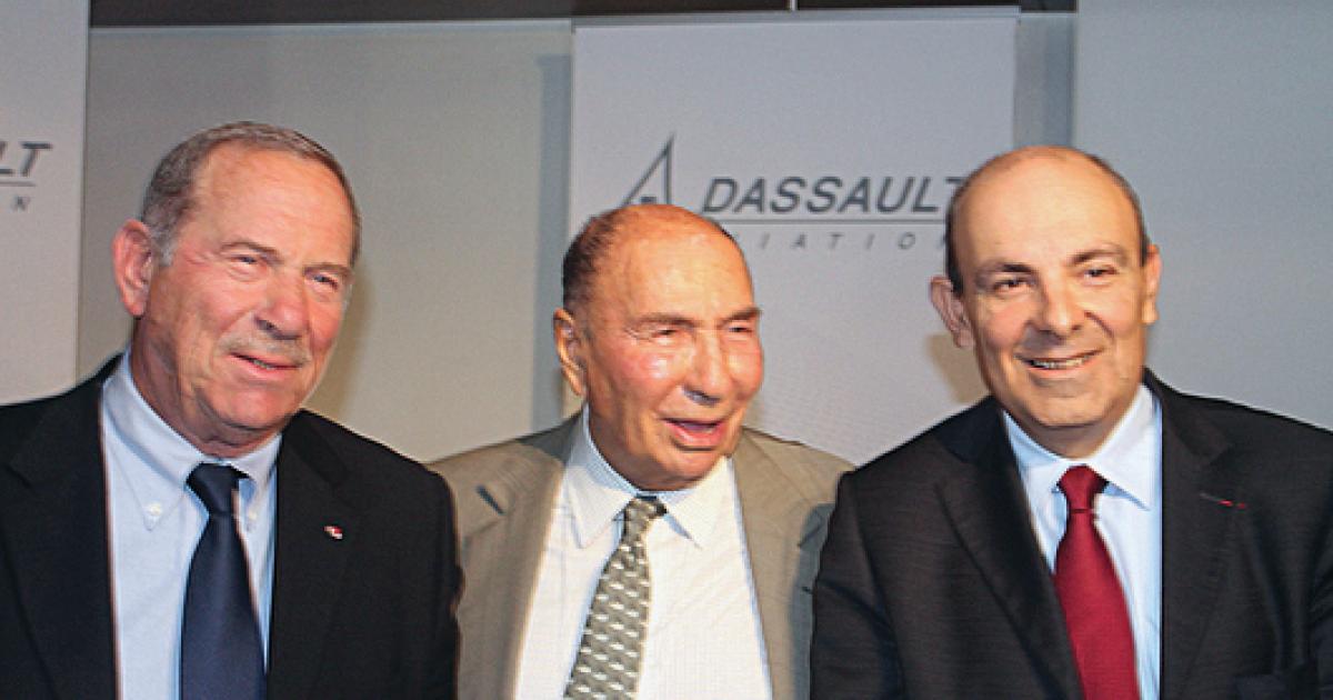 Three generations of Dassault leader­ ship at last Friday’s press conference: Eric Trappier (right) was joined by his predecessor Charles Edelstenne (left) and company patriarch Serge Dassault (centre). (Photo: Chris Pocock)