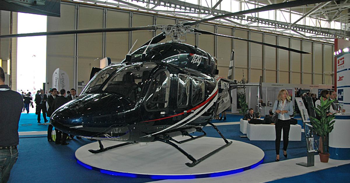 While there are 28 business jets on display at Jet Expo 2011 at Moscow Vnukovo-3, there is only one helicopter on display–this Bell 429 shown here. (Photo by Vladimir Karnozov)