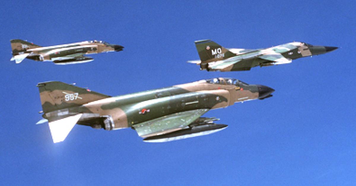 Two Korean F-4D Phantoms escort a U.S. Air Force F-111 during an exercise in the early 1980s. (Photo credit: U.S. Air Force)