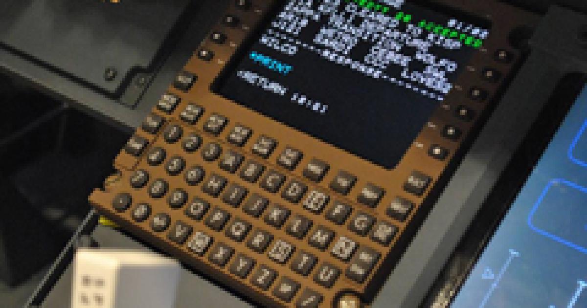 A multifunction control display unit mounted in an aircraft cockpit shows a controller-pilot datalink communications message. (Photo: FAA)