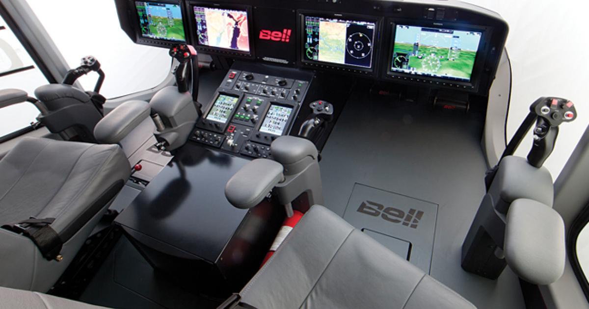 Bell engineers are continuing to develop the fly-by-wire flight controls for the Bell 525 through a system integration lab cockpit simulator in Fort Worth. The helicopter will feature a low-slung instrument panel with four Garmin G5000H screens, futuristic sidesticks and  plunging cockpit side windows for excellent visibility. 
