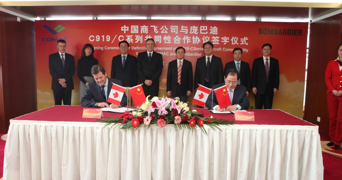 Pierre Beaudoin, Bombardier president and CEO, left, and Comac chairman Jin Zhuanglong sign a cooperation agreement March 21 in Shanghai. (Photo: Bombardier)